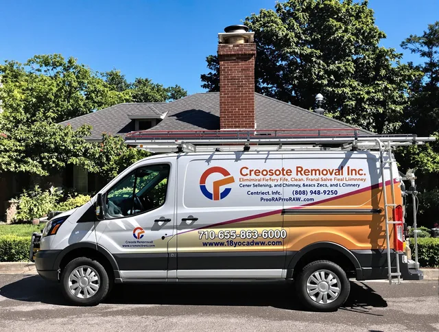 Warren Chimney Sweep technician removing creosote safely in Warren, RI